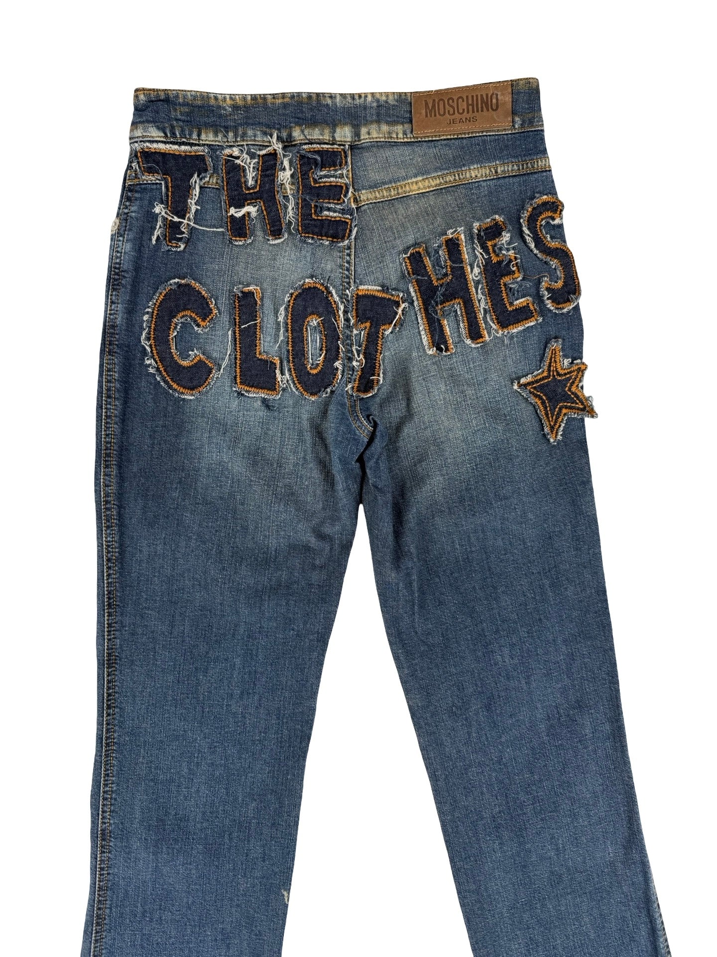 Moschino the clothes make the woman denim distressed fun  jeans