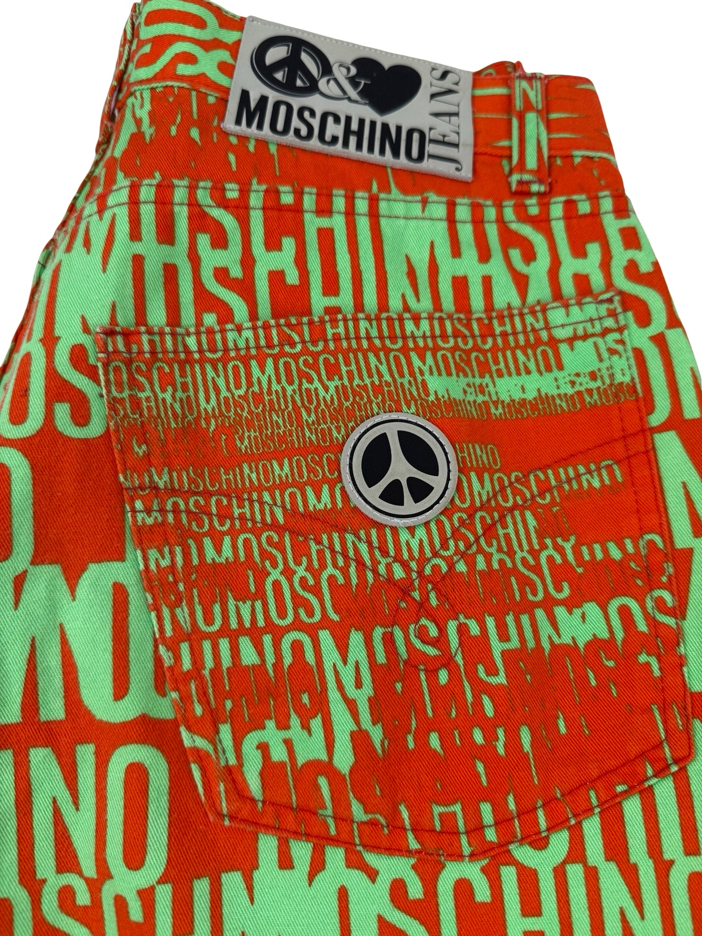 Moschino spell out orange & green jeans